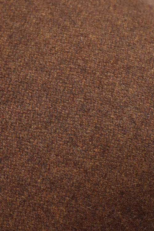 Een close up van een bruine wollen stof.