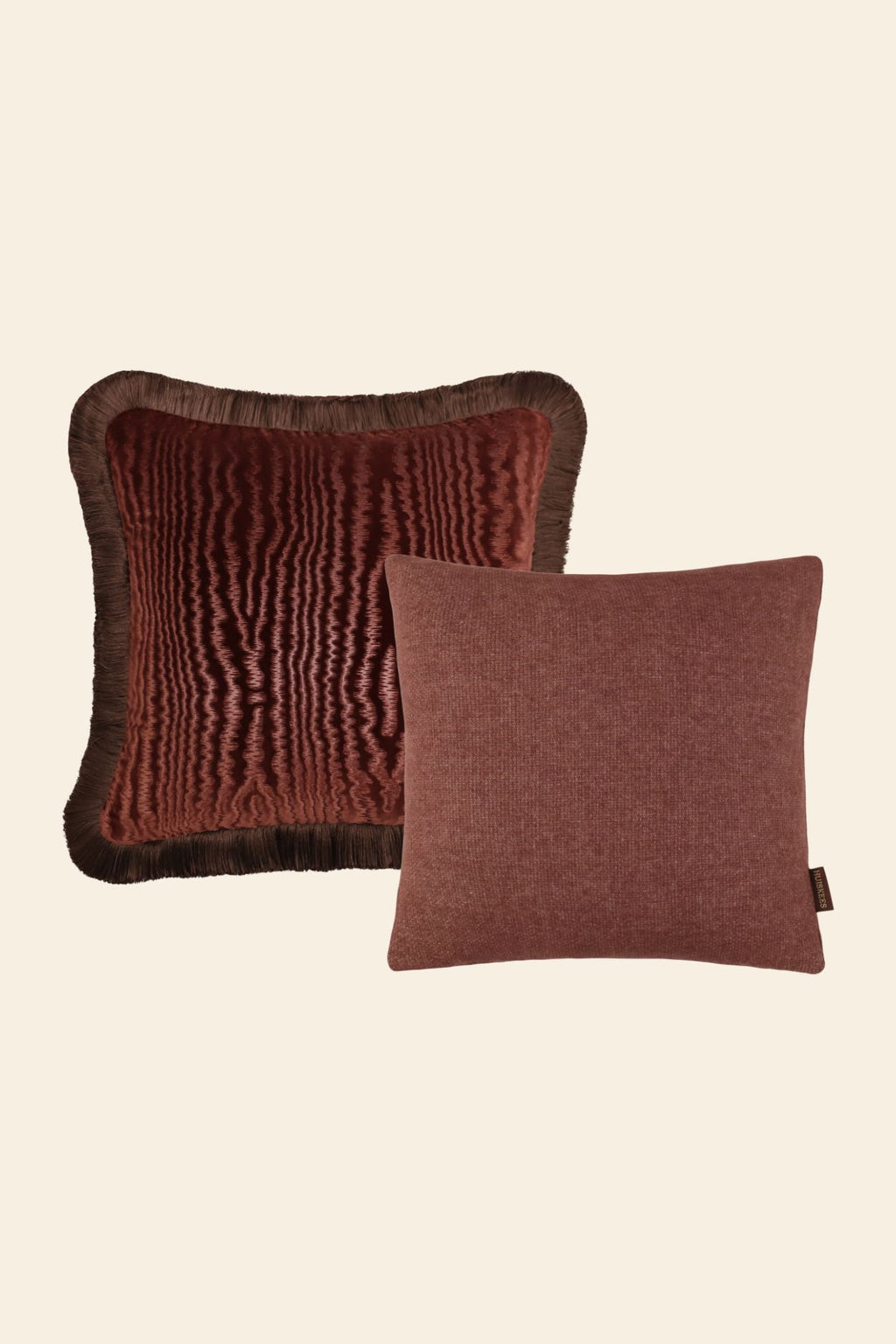 Een sierkussenset van twee kussens in het roze.